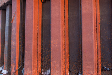 metal supports the stiffening rib rust at sunset