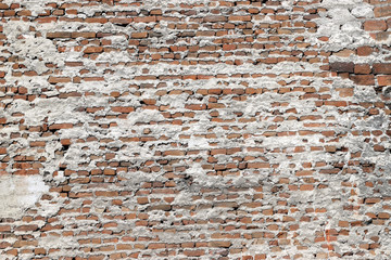 Old brick wall with cement background. Brick pattern