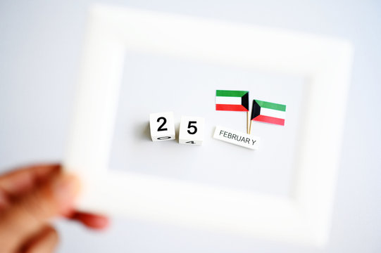 February 25 Wooden calendar Concept independence day of Kuwait and Kuwait national day with space for your text.