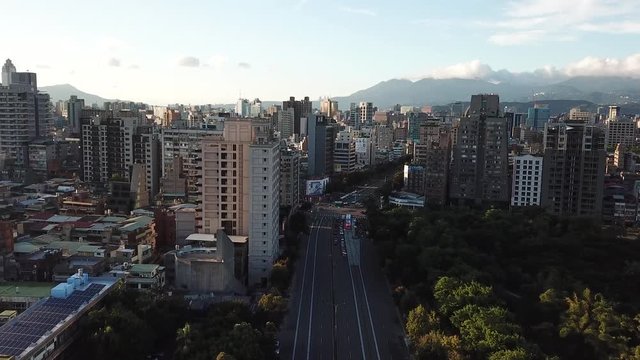 Aerial View of Taipei Taiwan Metro Downtown Skyline Under Evening Sun. Xinsheng Road and Daan Forest Park