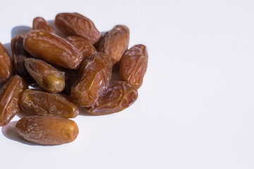 dried dates palm on white background