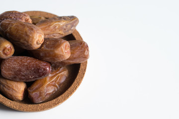 dried dates palm on white background