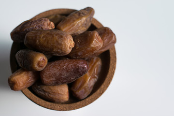 dried dates palm on white background