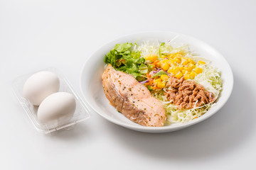High protein low carb diet menu made mainly of raw salmon, tuna, vegetables and eggs