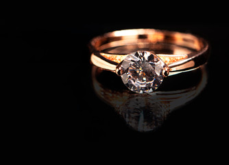 Wedding ring on black background