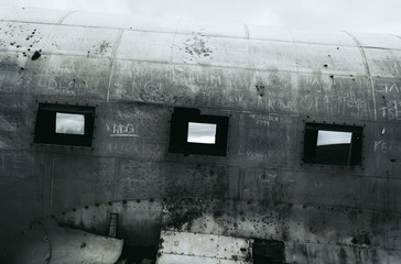 Windows of a famous plane in Iceland on black sand beach