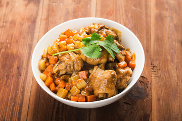 Chicken with potato and carrot in curry,