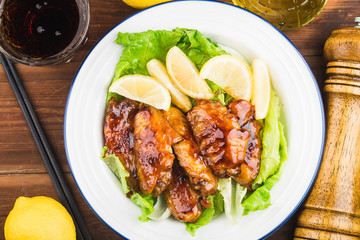 Cola chicken wings on plate