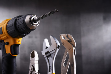  hardware tools including cordless drill and monkey spanner