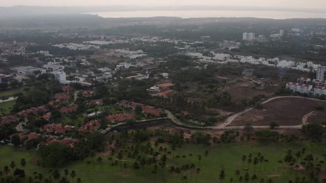 Acapulco Bay in Twilight, Aerial View of Apartment Buildings Comples With Pacific Ocean in Background