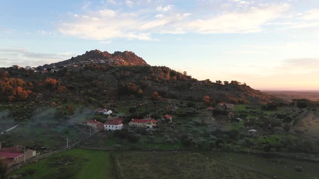 A collection of aerial views over Monsanto. Aldeia de Monsanto, is a historic village among granite cliff. Going uphill.