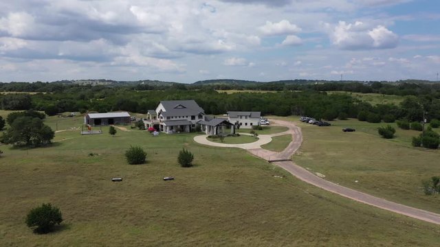 Drone footage over a beautiful ranch house south of Austin, Texas.