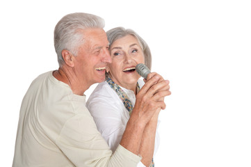 Portrait of a senior couple with microphone
