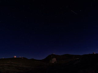 Night astrophotography, sky with stars at Roque de los Muchachos with telescopes of astronomical observatory, la Palma, Canary islands, Spain © Kristyna