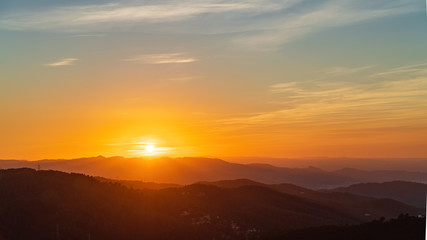 Obraz premium Sunset over the hills to the north of Barcelona, Spain