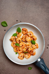 Top view of fried king prawns in a pan