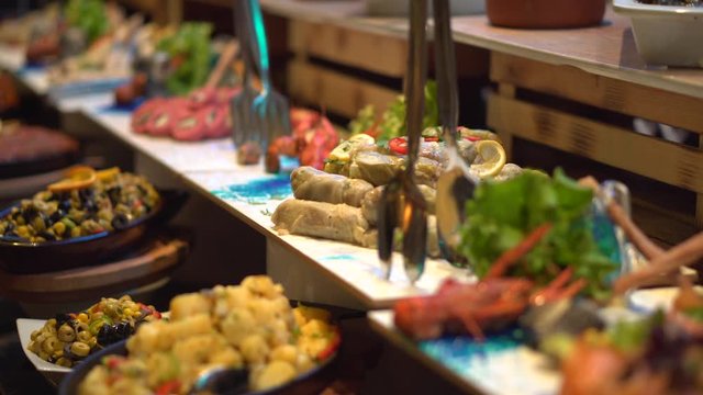 Cold dishes in the all-inclusive hotel restaurant. Meals on vacation. Fresh food