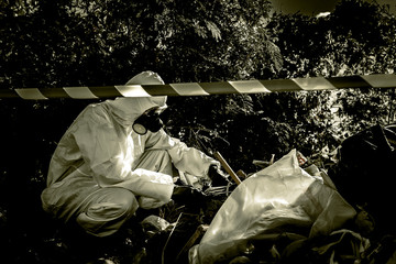 Asian scientist wear Chemical protection suit check danger chemical,working at dangerous zone,Collecting samples in case of Corona virus investigation outbreaked from China.