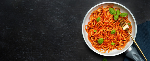 Delicious pasta with tomato sauce anf basil