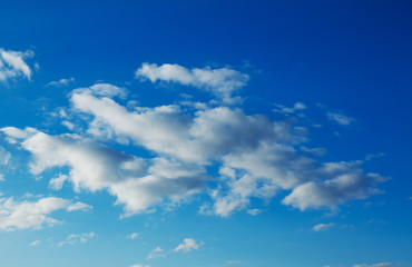 Beautiful feather clouds on blue sky as background