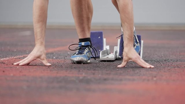 athlete in sprintstart in track and field