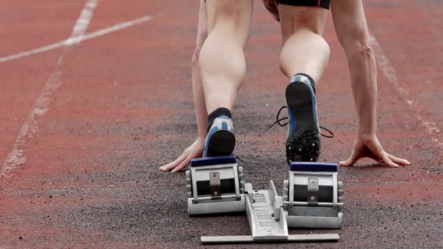 athlete in sprintstart in track and field