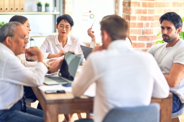 Group of business workers working together at the office
