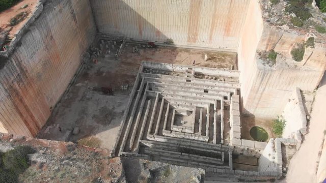 drone footage of  Lithica Ciutadella in menorca spain paning right at the historic labyrinth