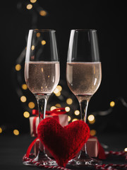 Champagne glasses on a dark background. Celebrate Valentine's day