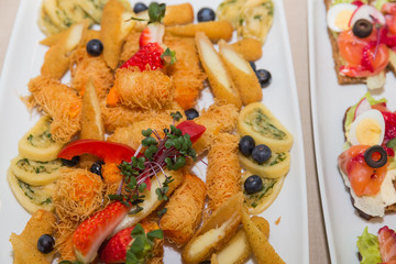 City Cesis, Latvia. Snacks and salads are on the table.