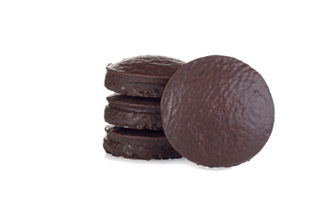 pile of chocolate covered sponge cakes