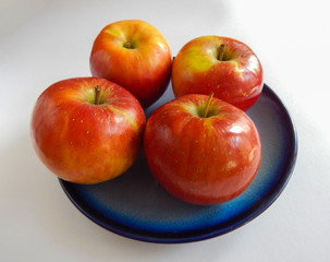 red apples in a plate