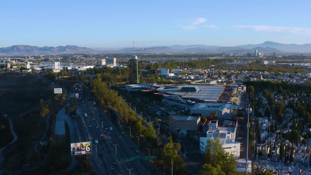 Drone flight around the Periferico Avenue, the Corey Tower and the Concentro compound in Zapopan (Guadalajara), Jalisco, Mexico.