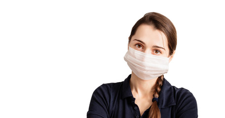 young clever woman with a medical mask on her face isolated on a white background