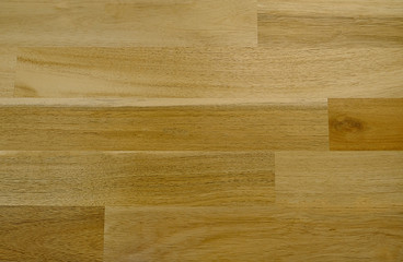 The wooden structure of the laminate. The texture of the parquet. Wood parquet texture, wooden floor background