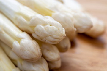 New harvest of white asparagus vegetable in spring season , washed white asparagus ready to cook, spring menu for restaurants