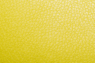 yellow leather background or texture. texture photo closeup