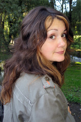 Fototapeta premium portrait of young woman in park