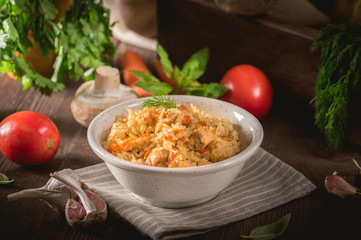 Rice pilaf with chicken meat and vegetables