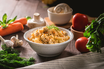 Rice pilaf with chicken meat and vegetables