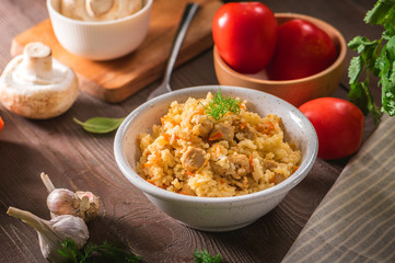 Rice pilaf with chicken meat and vegetables