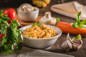 Rice pilaf with chicken meat and vegetables