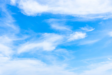 Naklejka na ściany i meble Blue sky with close up white fluffy tiny clouds background and pattern
