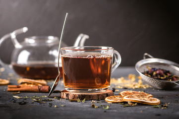 A Cup of freshly brewed black tea on dark background