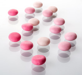 Sweet pink round candies, drops