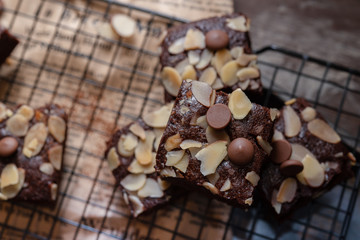 A lot of homemade Chocolate Brownies Placed on the black steel grill