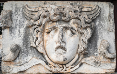 The statue of the mythological entity medusa, known for its snake hair. The head statue, which became the symbol of the temple of Apollo and Didyma.