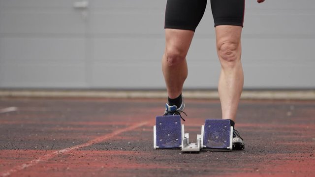 athlete in sprintstart in track and field