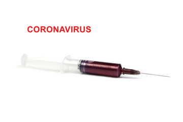 Fototapeta premium Coronavirus 2019-nCoV epidemic virus. Pneumonia and Respiratory Syndrome.5 ml syringe with red liquid lies on the white background. Blood Sample concept.