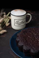 Tasty homemade chocolate cake with cup of coffe. Brownie. Chocolate pie.
